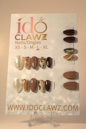 A set of brown designer press on nails by I Do Clawz
